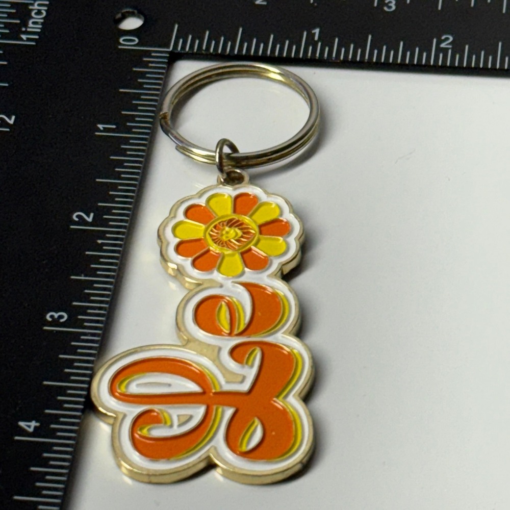 Groovy Leo Zodiac Flower Keychain Orange Yellow White Gold Tone